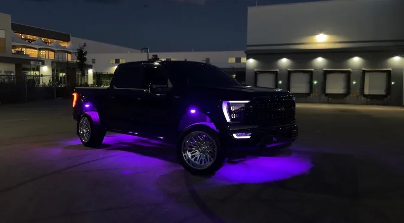 RGB rock lights glowing under a truck in Edmonton, Alberta